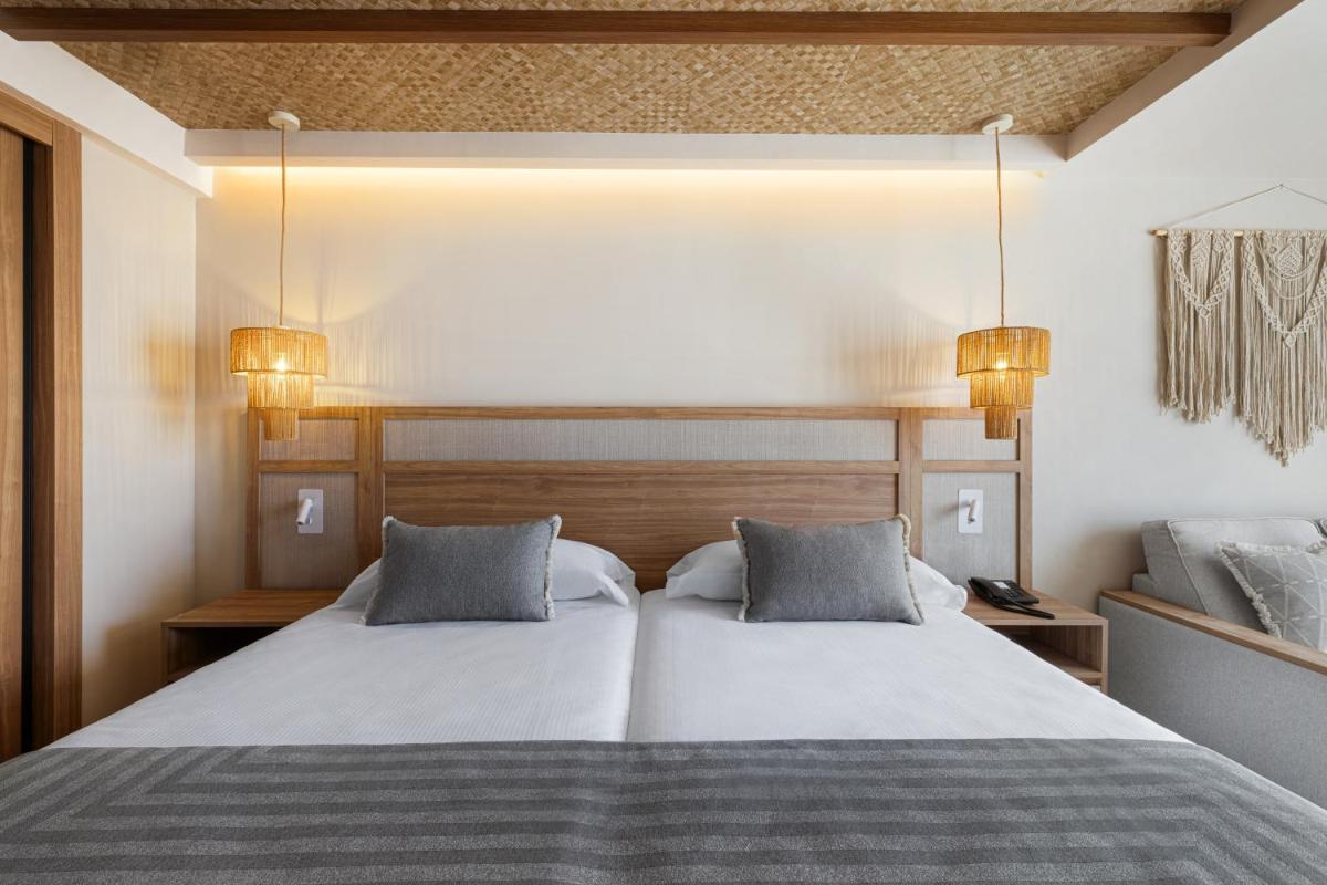 Cama o camas de una habitación en Hotel Riu Palace La Mola