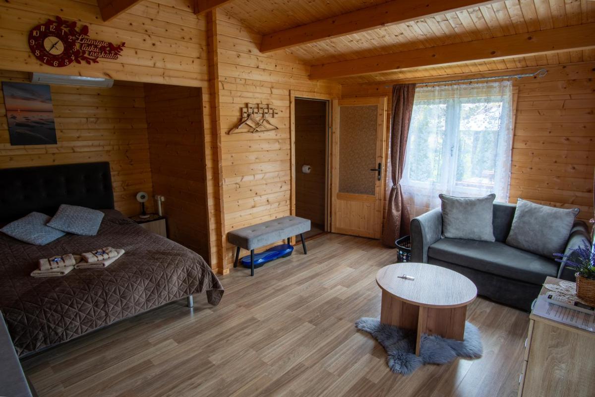 Atpūtas mājiņas Kolkā- Madaras un Rota - Housity