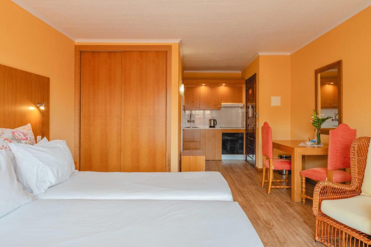 Uma cama ou camas num quarto em Quinta Splendida Wellness & Botanical Garden