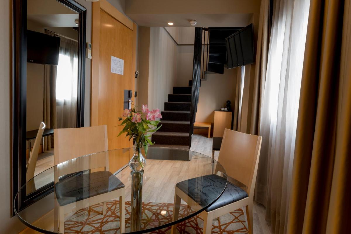 Zona de estar de Hotel Plaza