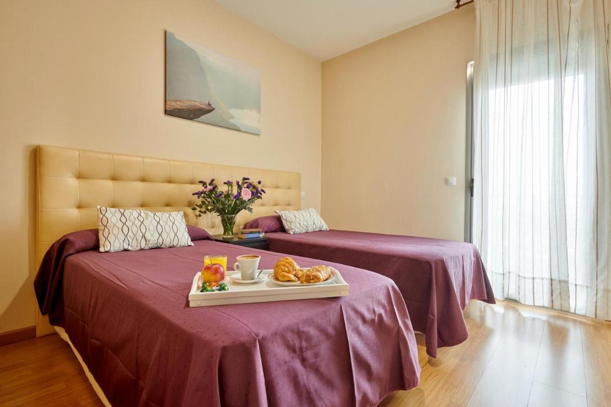 Aparthotel Encasa - Housity