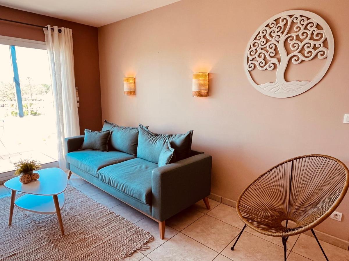 Coin salon dans l'établissement Résidence Hôtelière Natureva & Spa
