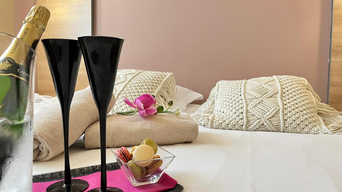 Coin salon dans l'établissement Résidence Hôtelière Natureva & Spa
