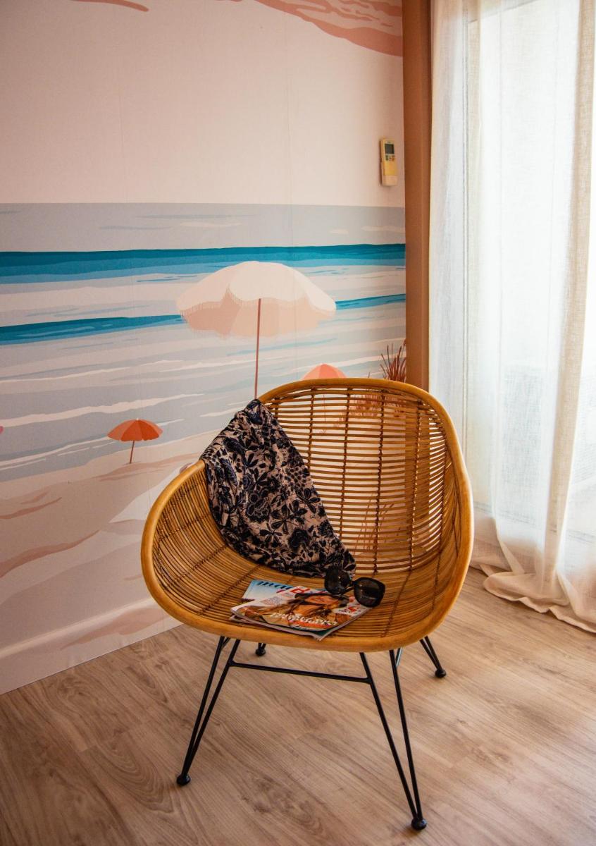 Coin salon dans l'établissement Résidence Hôtelière Natureva & Spa