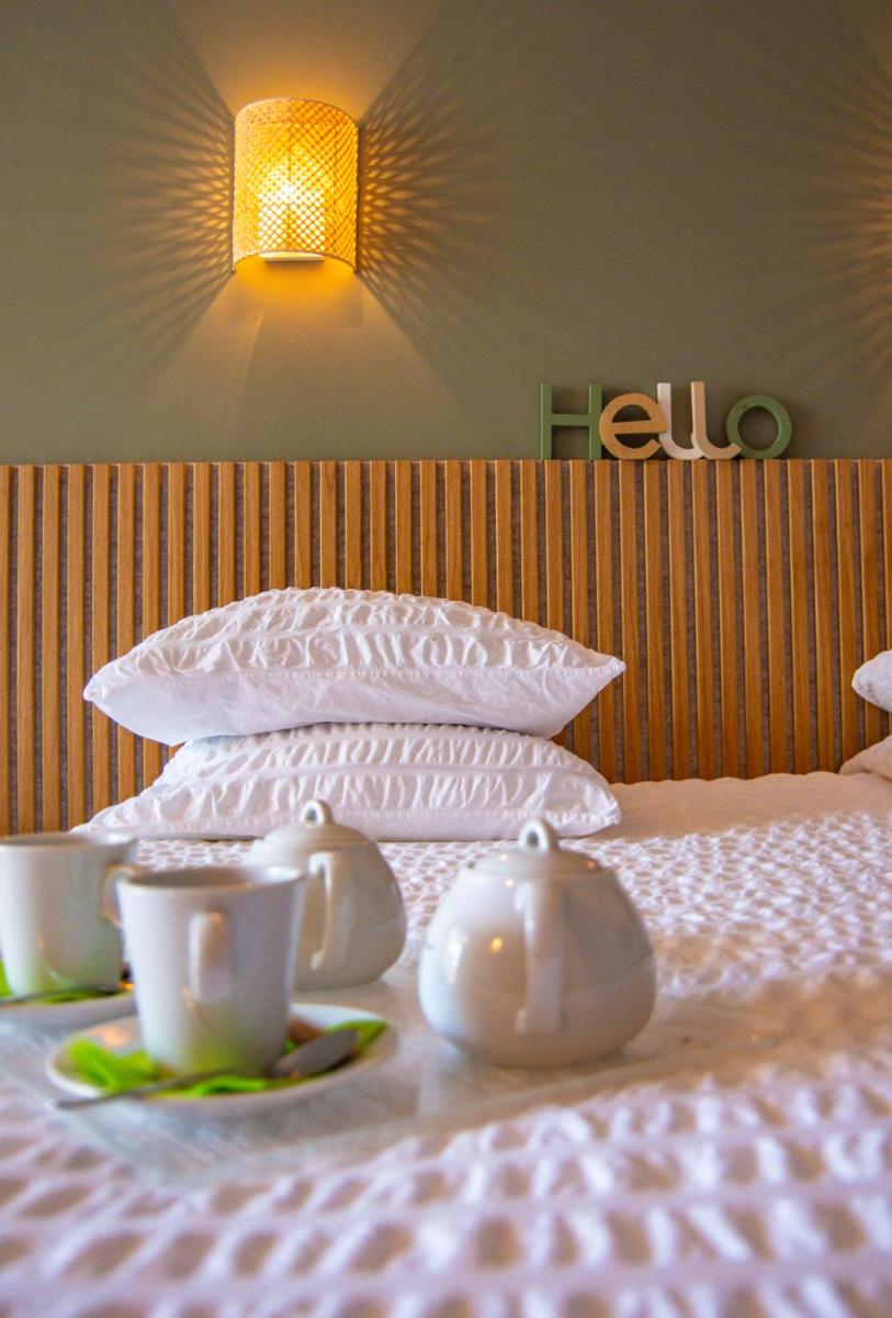 Un ou plusieurs lits dans un hébergement de l'établissement Résidence Hôtelière Natureva & Spa