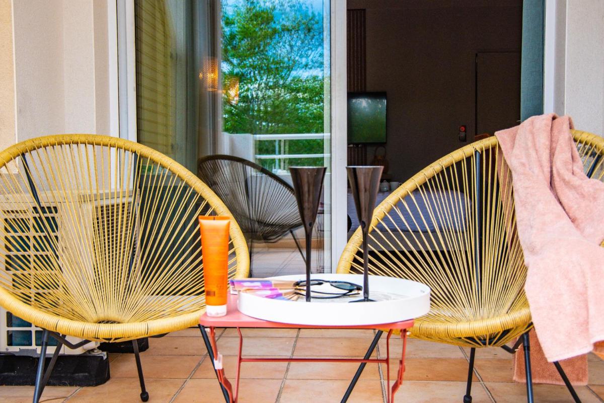 Balcon ou terrasse dans l'établissement Résidence Hôtelière Natureva & Spa