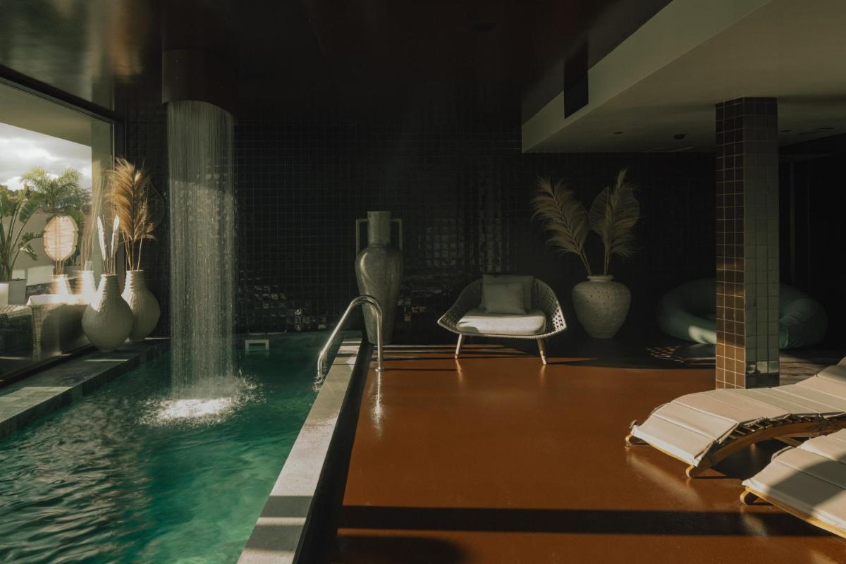 A piscina em ou perto de Hotel Leiriartem by Grupo Quinta dos Lagos