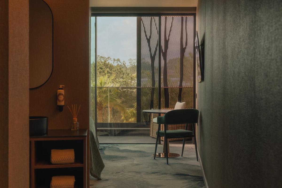 Uma área de estar em Hotel Leiriartem by Grupo Quinta dos Lagos