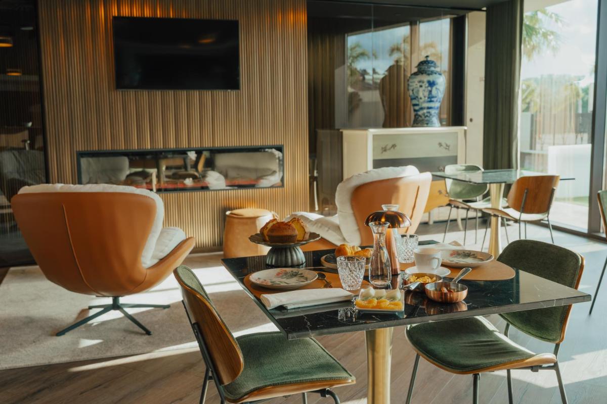 Uma área de estar em Hotel Leiriartem by Grupo Quinta dos Lagos