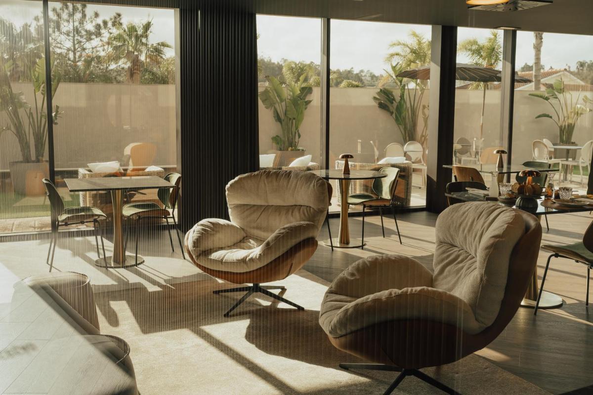 Uma área de estar em Hotel Leiriartem by Grupo Quinta dos Lagos