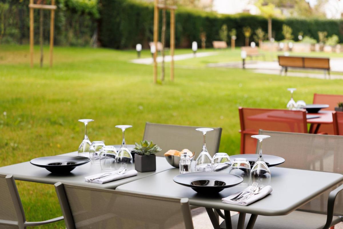 Jardin de l'établissement Les Boréales - Appart'hotel & Restaurant