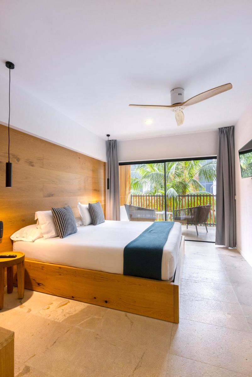 Cama o camas de una habitación en Las Gaviotas Suites Hotel & Spa