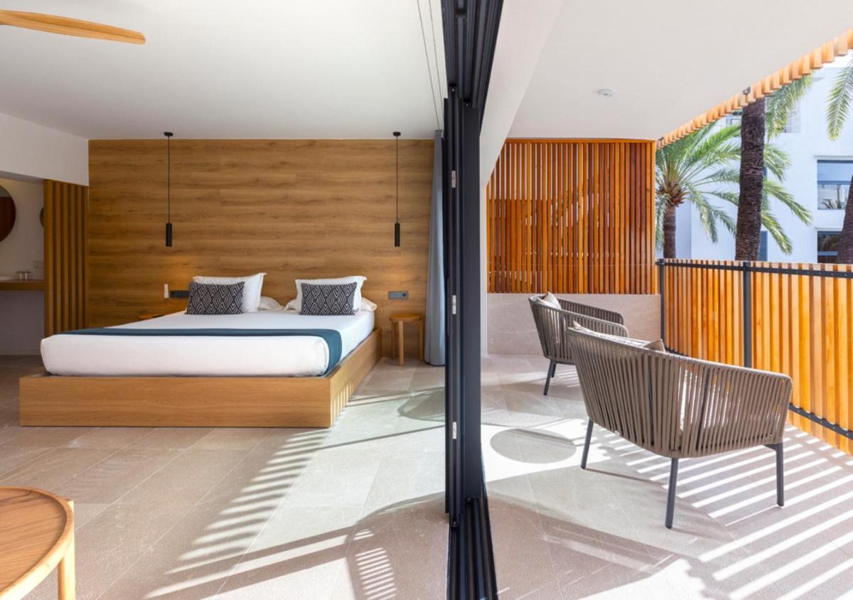 Cama o camas de una habitación en Las Gaviotas Suites Hotel & Spa
