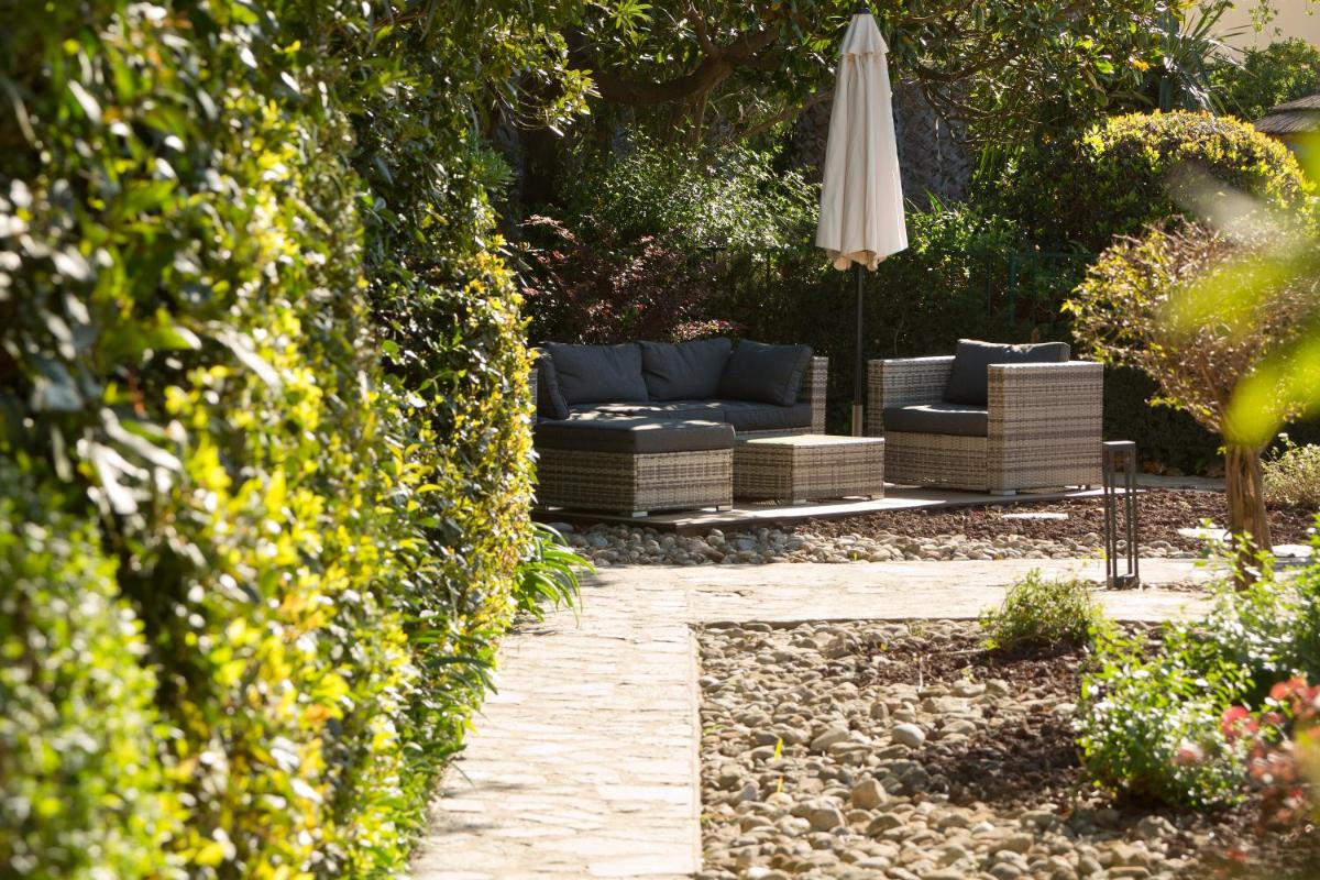 Jardin de l'établissement Le Cottage - Hotel & Spa