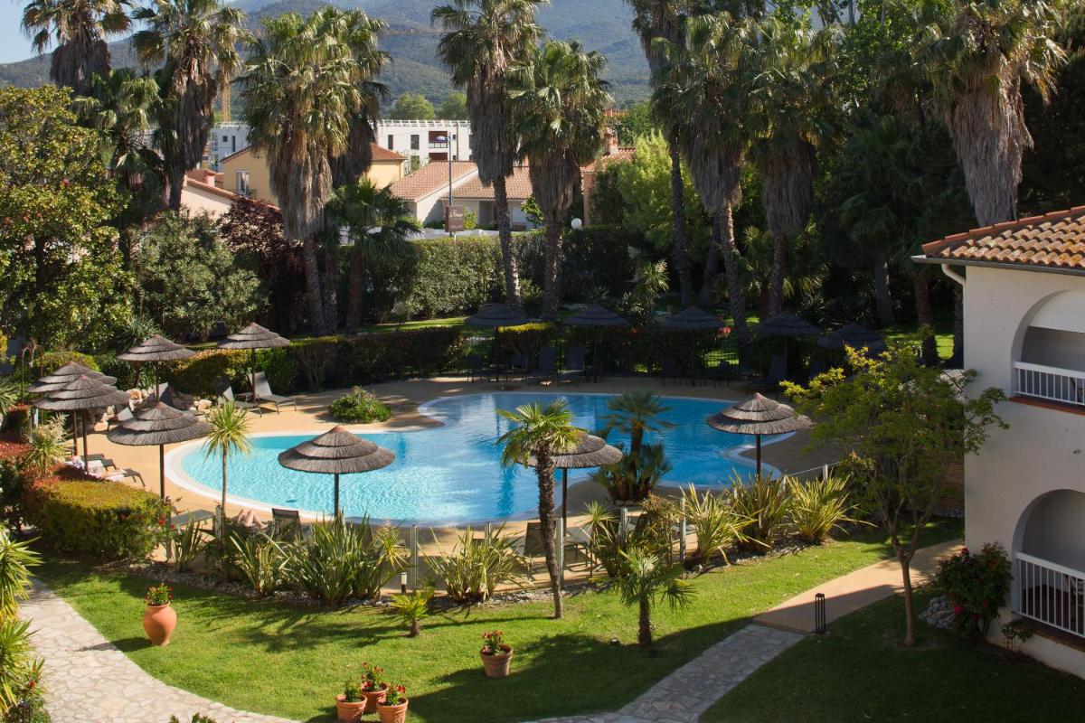 Piscine de l'établissement Le Cottage - Hotel & Spa ou située à proximité