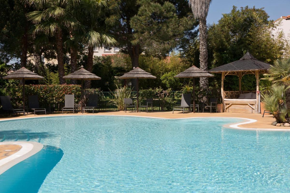 Piscine de l'établissement Le Cottage - Hotel & Spa ou située à proximité