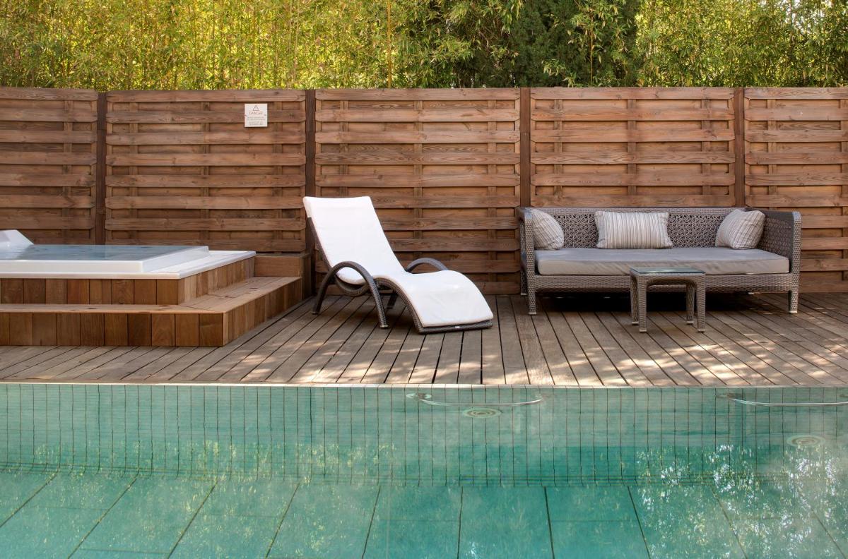 Piscine de l'établissement Le Cottage - Hotel & Spa ou située à proximité