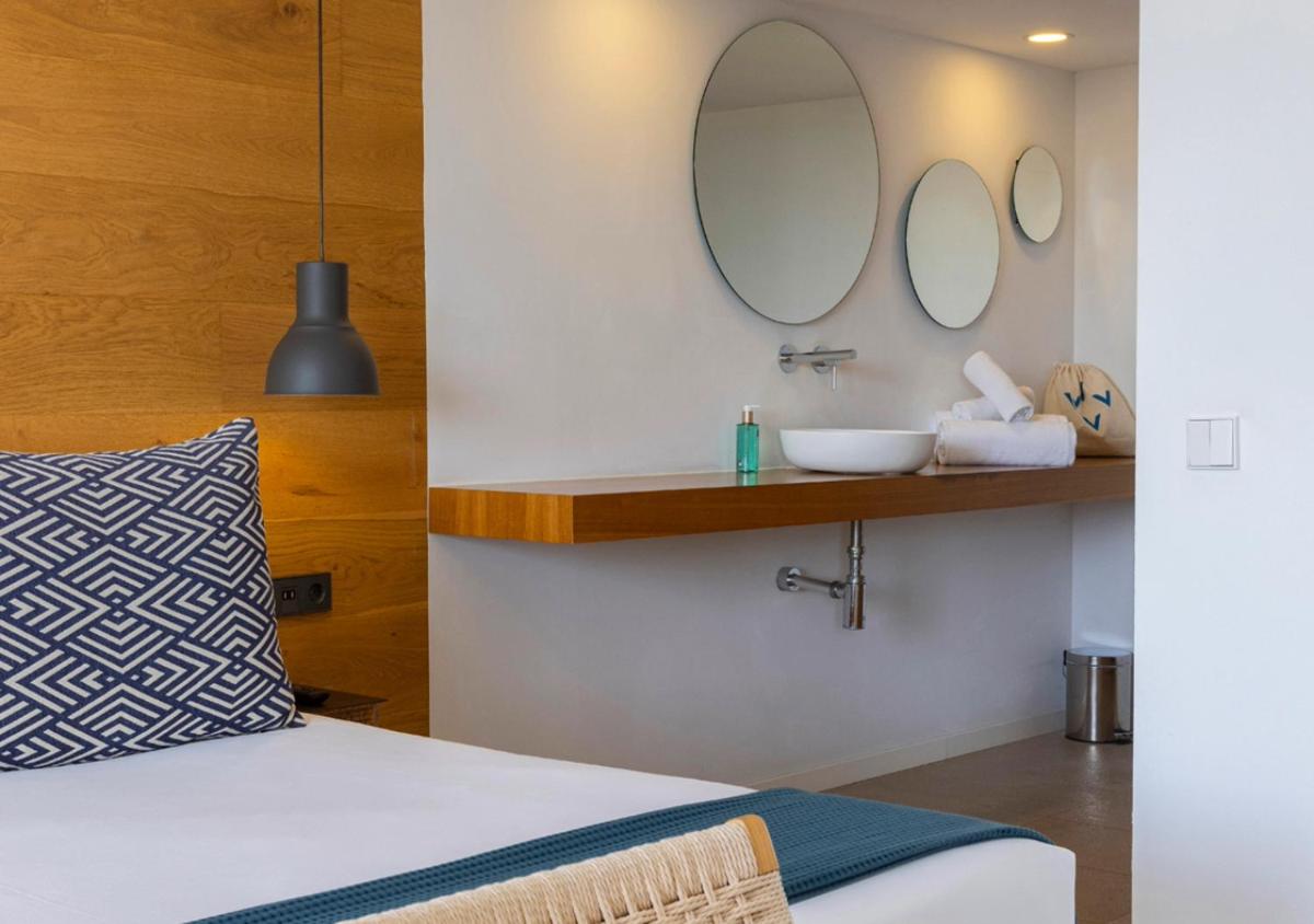 Cama o camas de una habitación en Las Gaviotas Suites Hotel & Spa