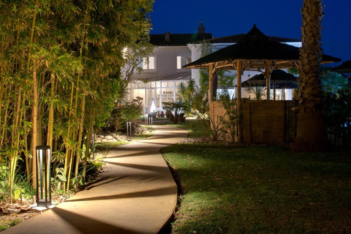 Jardin de l'établissement Le Cottage - Hotel & Spa