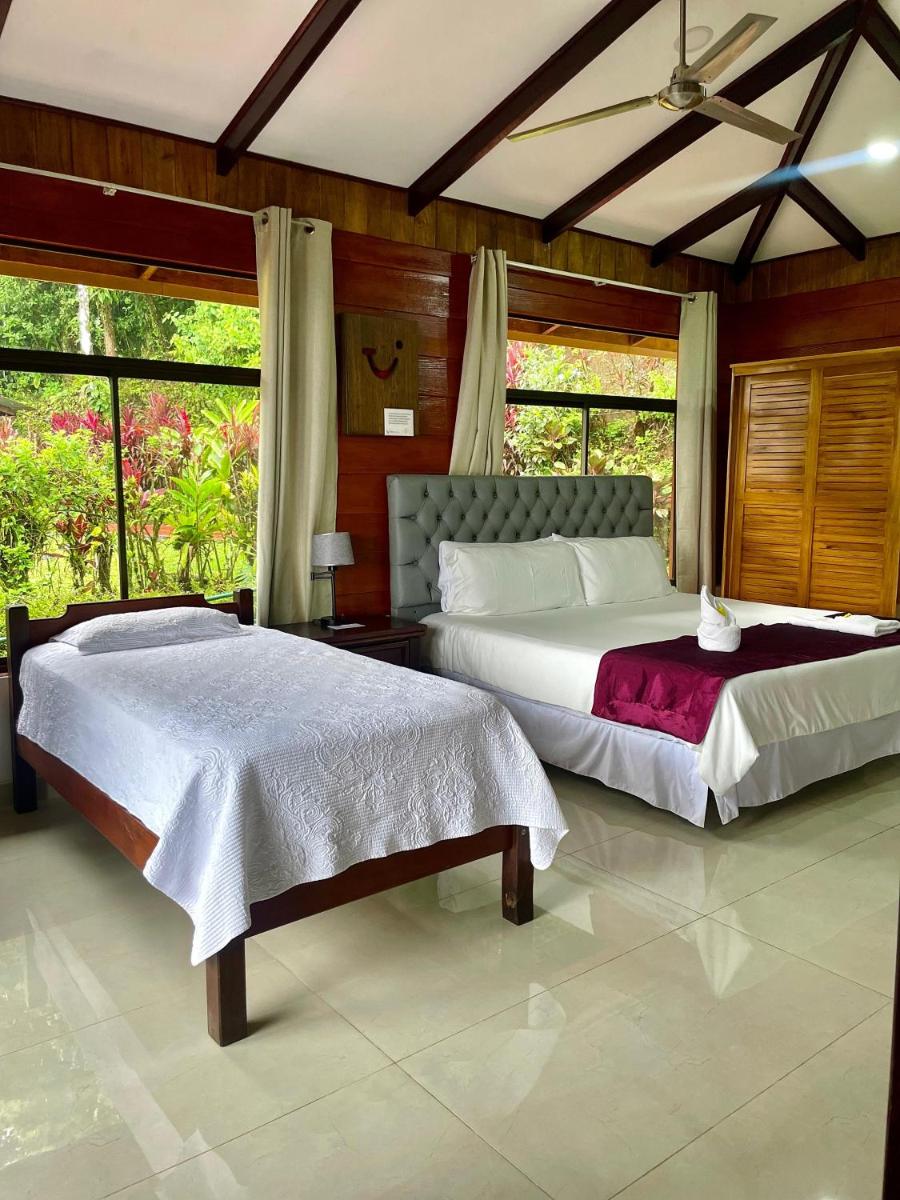 Hotel y Puentes Colgantes Heliconias Rainforest Lodge - Housity