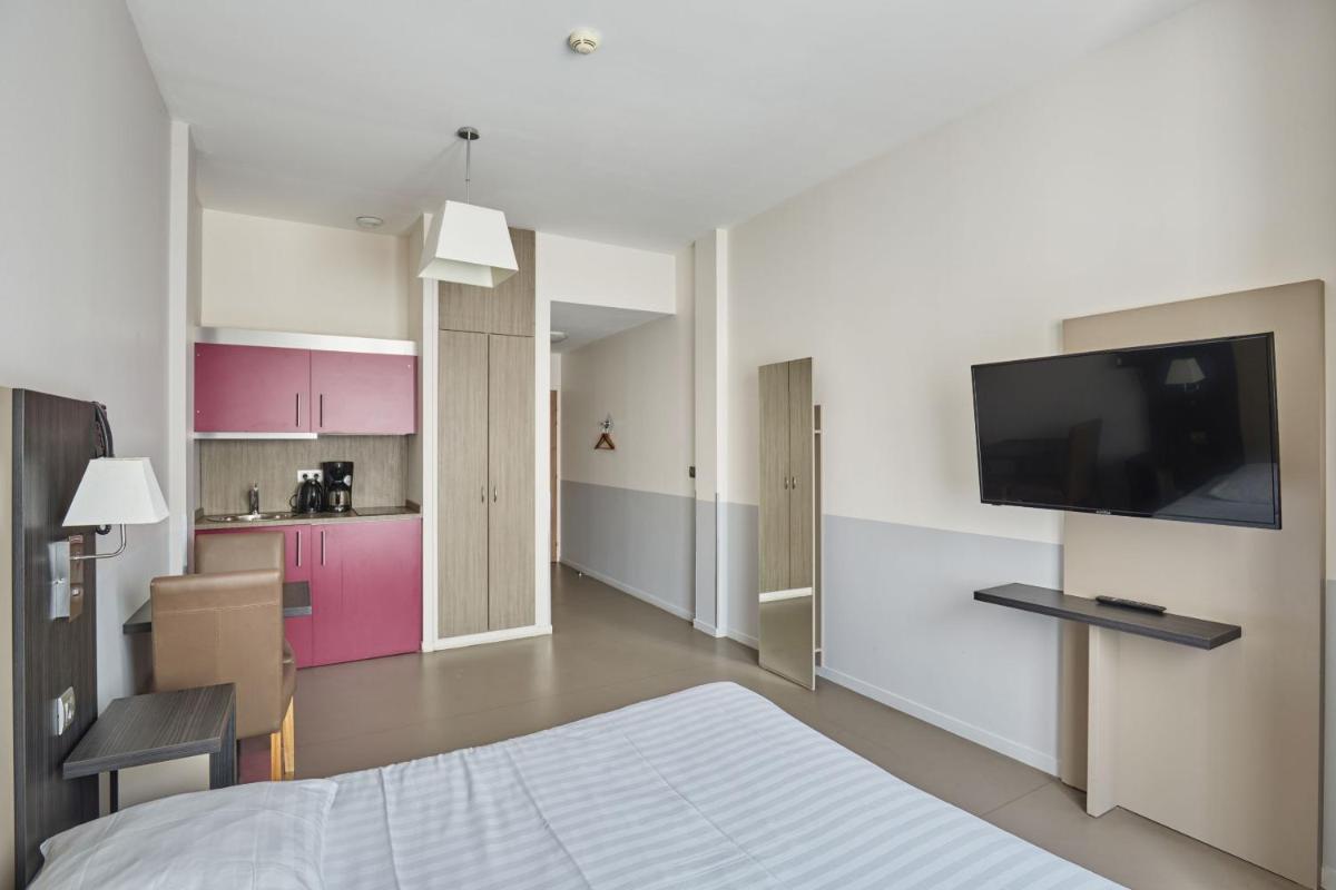 Cuisine ou kitchenette dans l'établissement Appart'hôtel Odalys City - Dijon Centre Les Cordeliers