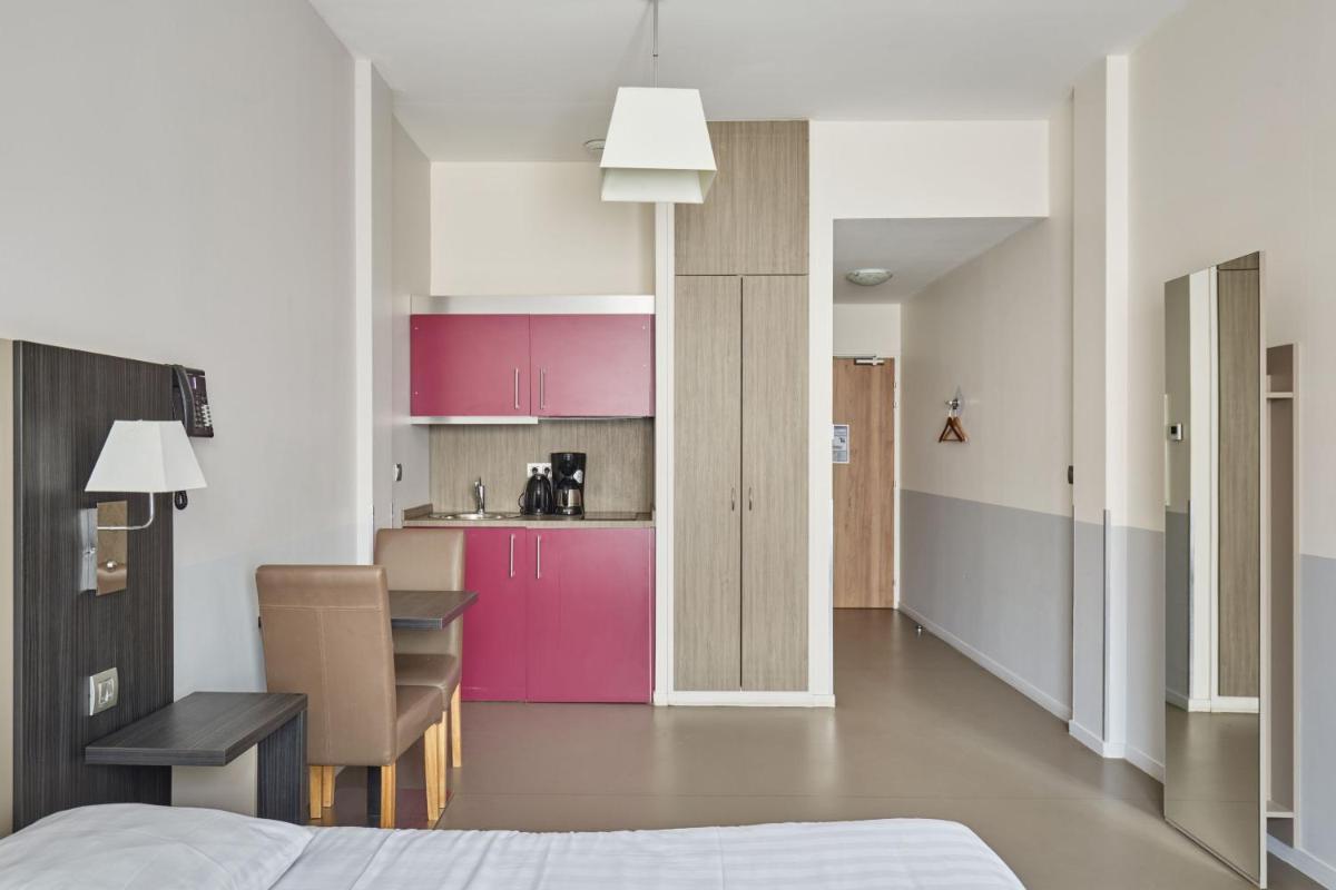 Cuisine ou kitchenette dans l'établissement Appart'hôtel Odalys City - Dijon Centre Les Cordeliers