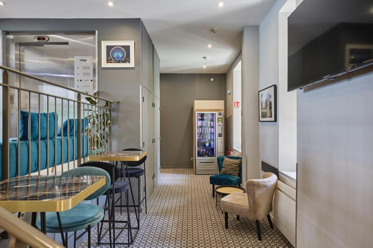 Coin salon dans l'établissement Appart'hôtel Odalys City - Dijon Centre Les Cordeliers