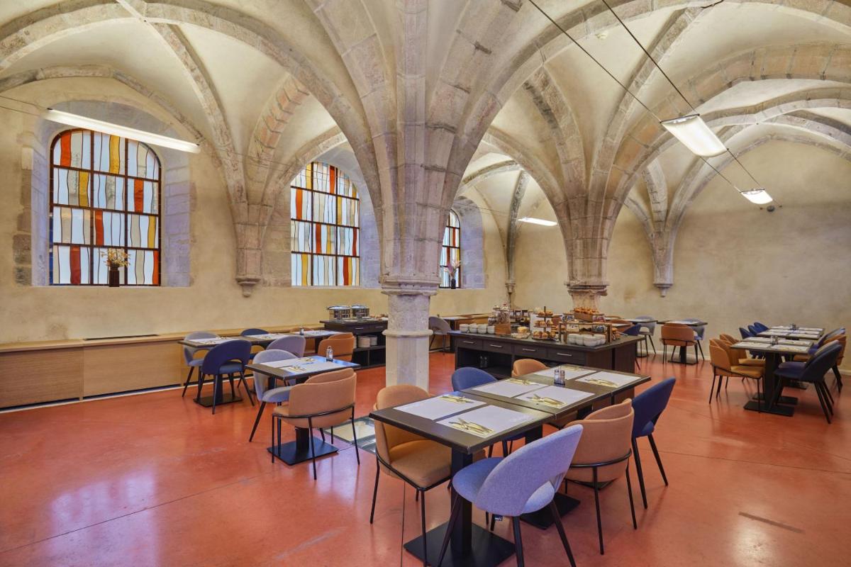 Restaurant ou autre lieu de restauration dans l'établissement Appart'hôtel Odalys City - Dijon Centre Les Cordeliers