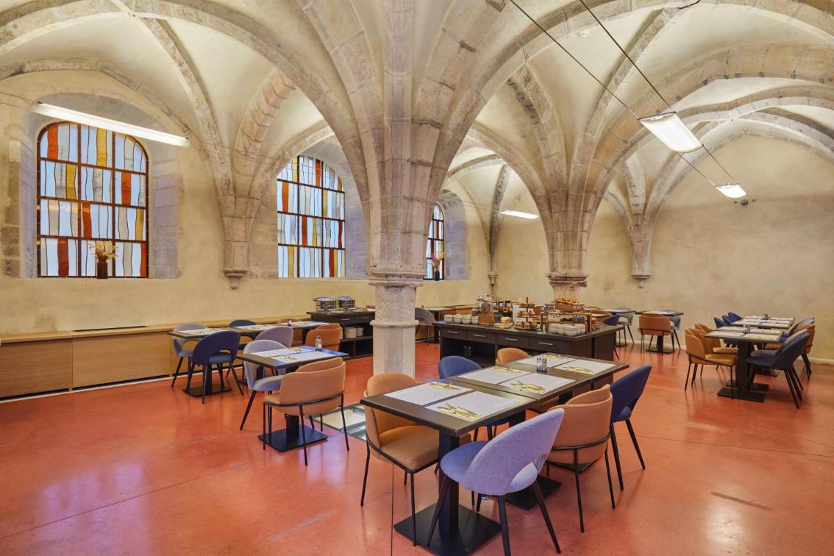 Restaurant ou autre lieu de restauration dans l'établissement Appart'hôtel Odalys City - Dijon Centre Les Cordeliers