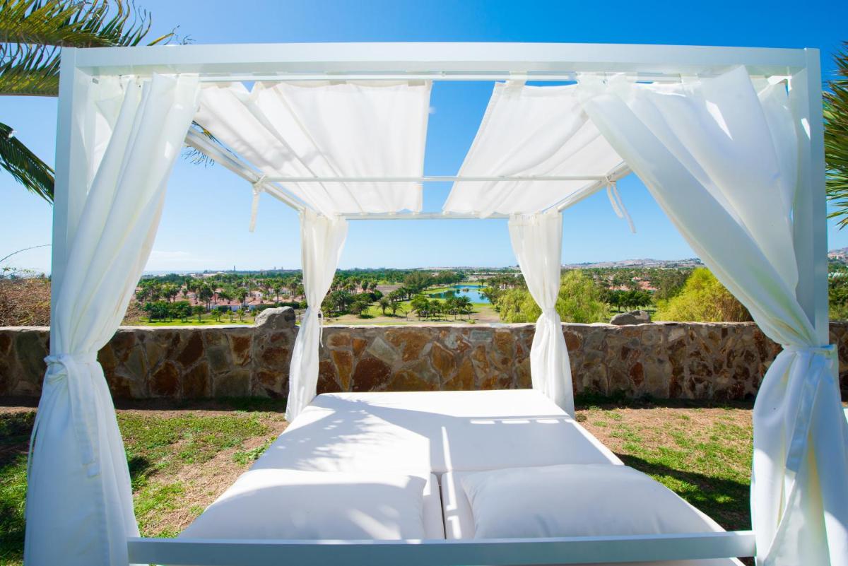Cama o camas de una habitación en Bull Vital Suites & Spa Boutique Hotel - Only Adults