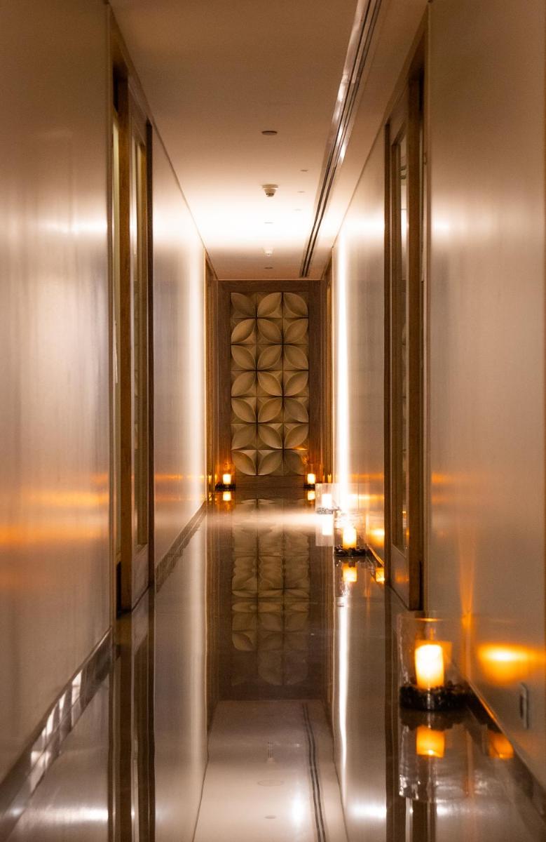 a hallway of a hotel with a wine tasting room at Marriott Suites Pune in Pune