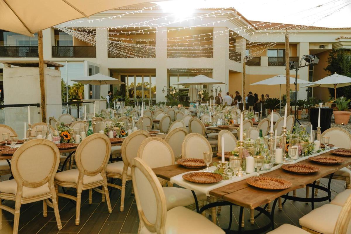 Um restaurante ou outro lugar para comer em Wyndham Grand Algarve