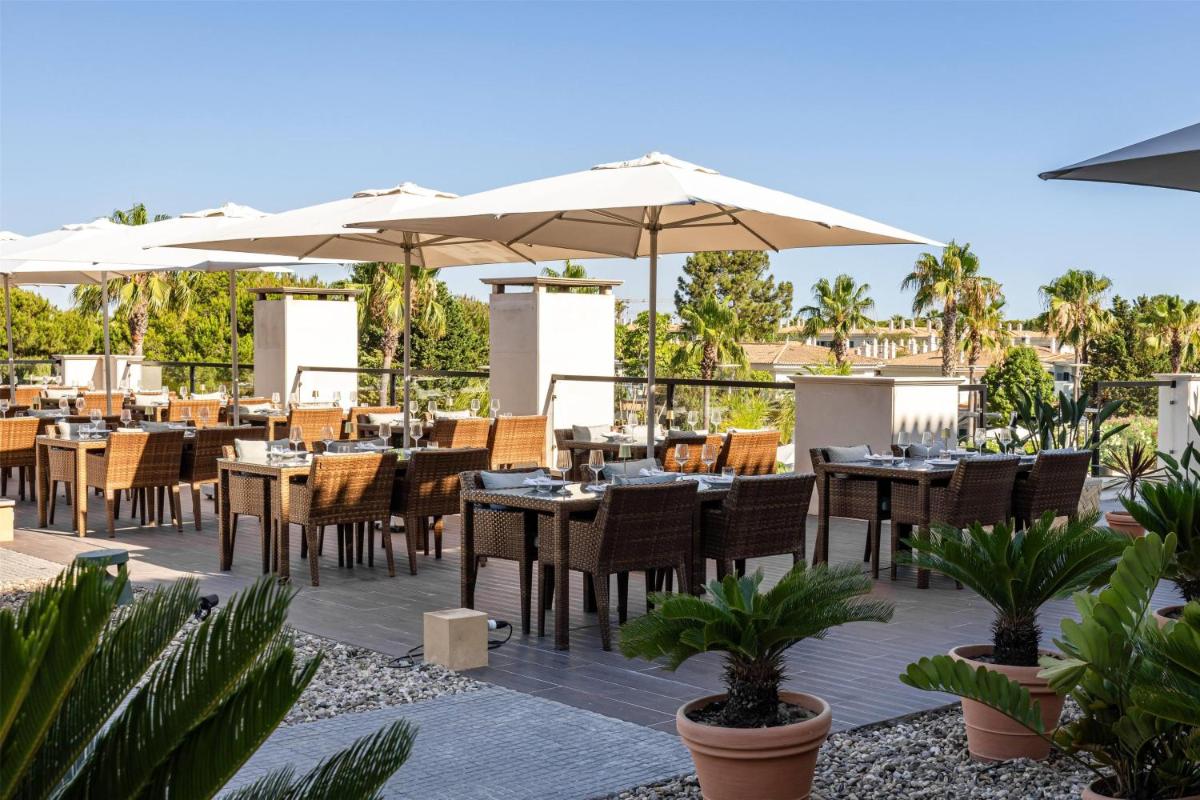 Um restaurante ou outro lugar para comer em Wyndham Grand Algarve