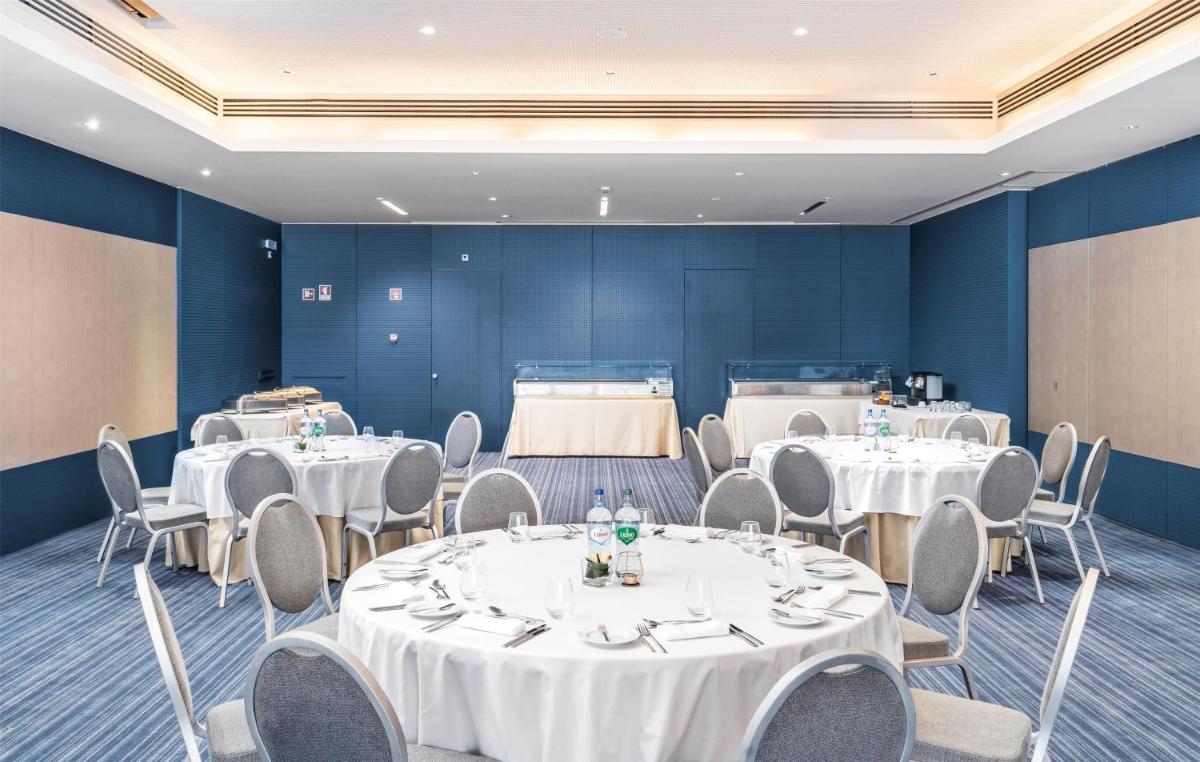 Um restaurante ou outro lugar para comer em Wyndham Grand Algarve