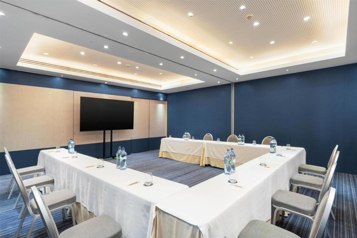 Uma televisão e/ou sistema de entretenimento em Wyndham Grand Algarve