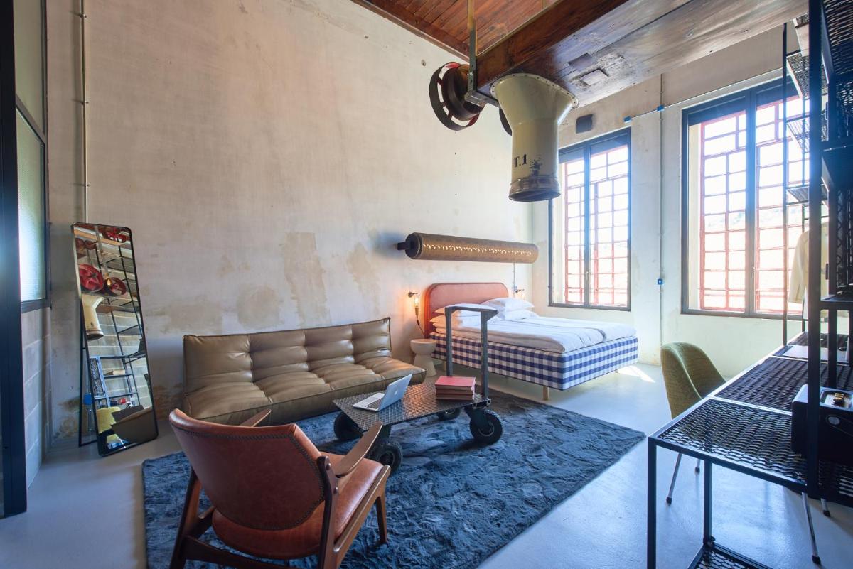 Uma área de estar em Moagem Industrial Lodge
