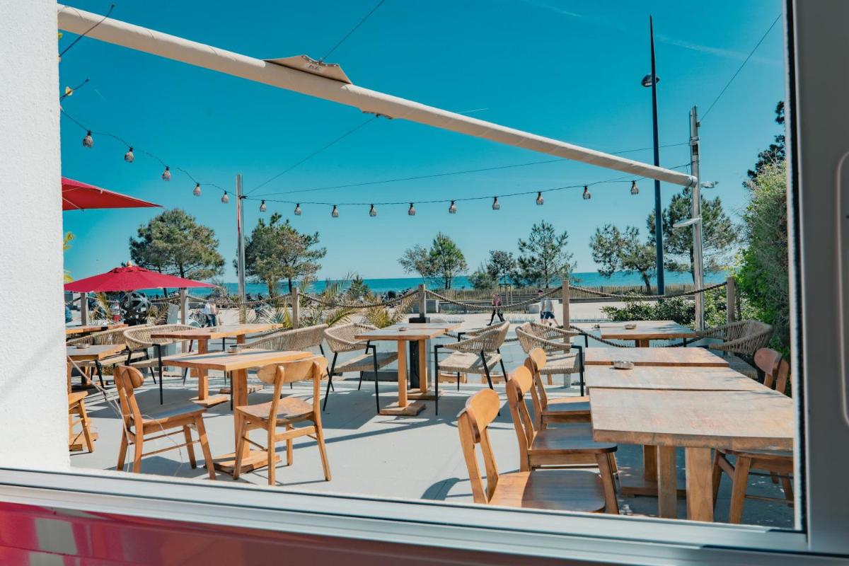 Restaurant ou autre lieu de restauration dans l'établissement Hôtel Édenia - Spa Estime&Sens