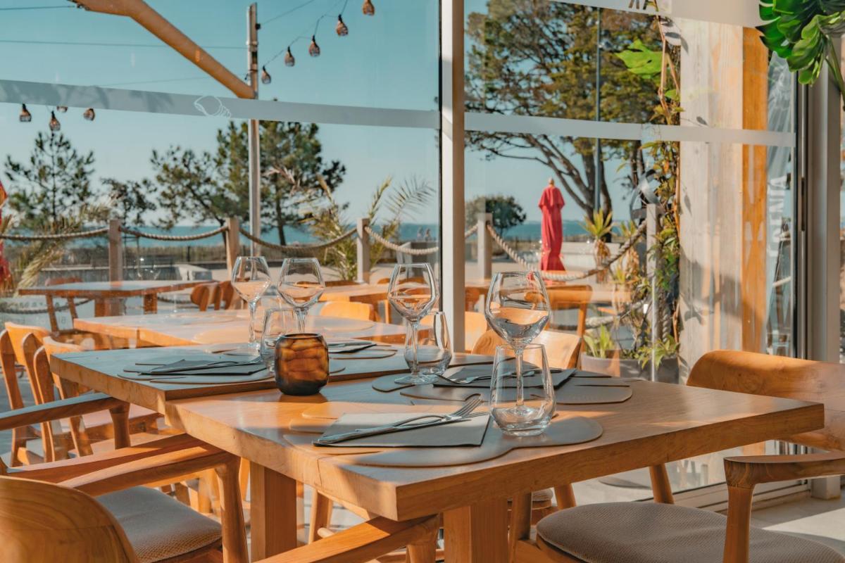Restaurant ou autre lieu de restauration dans l'établissement Hôtel Édenia - Spa Estime&Sens