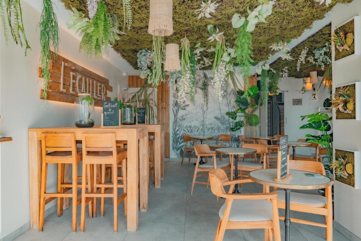 Restaurant ou autre lieu de restauration dans l'établissement Hôtel Édenia - Spa Estime&Sens