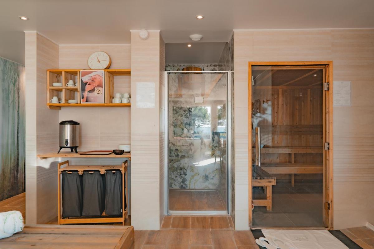 Cuisine ou kitchenette dans l'établissement Hôtel Édenia - Spa Estime&Sens