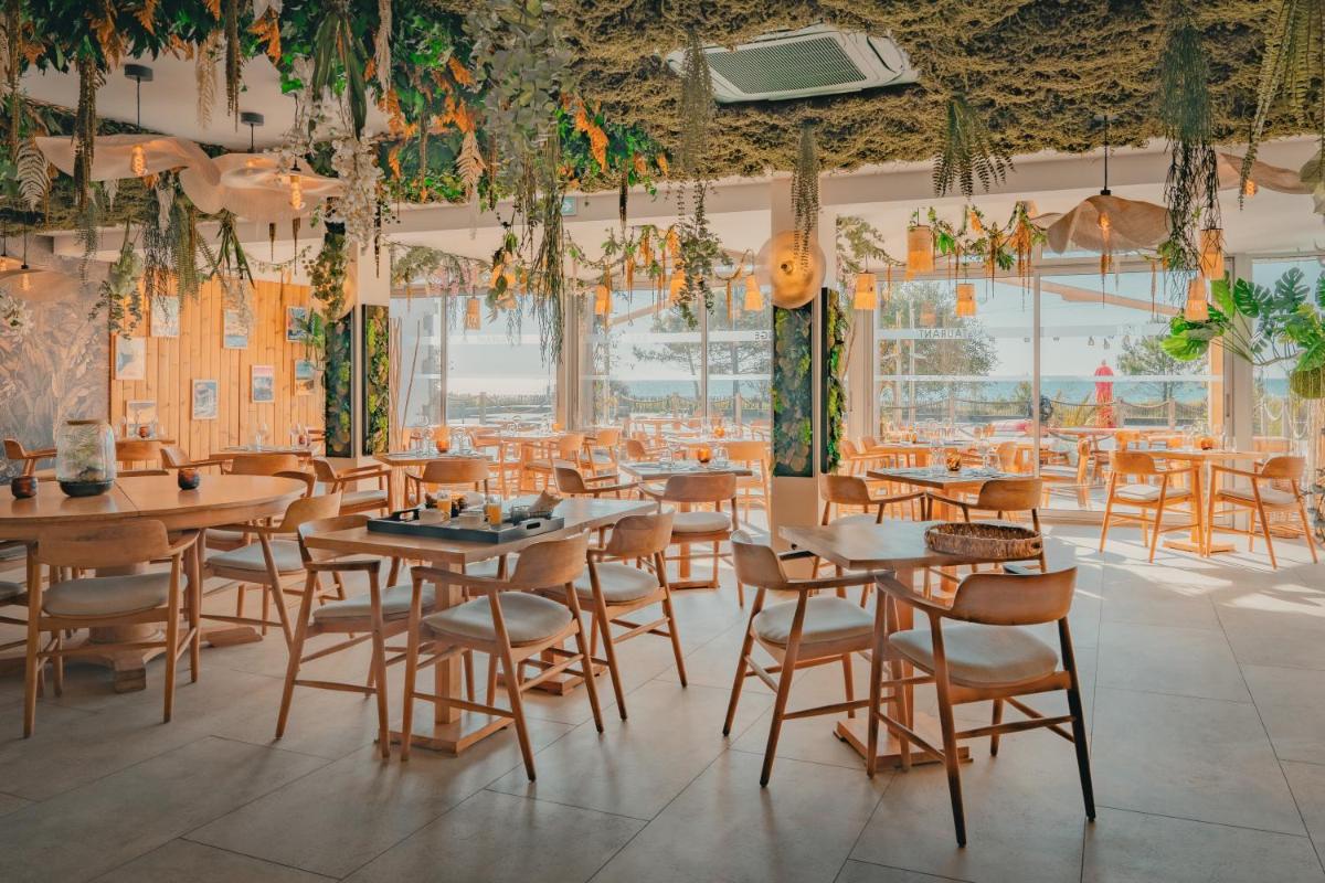 Restaurant ou autre lieu de restauration dans l'établissement Hôtel Édenia - Spa Estime&Sens