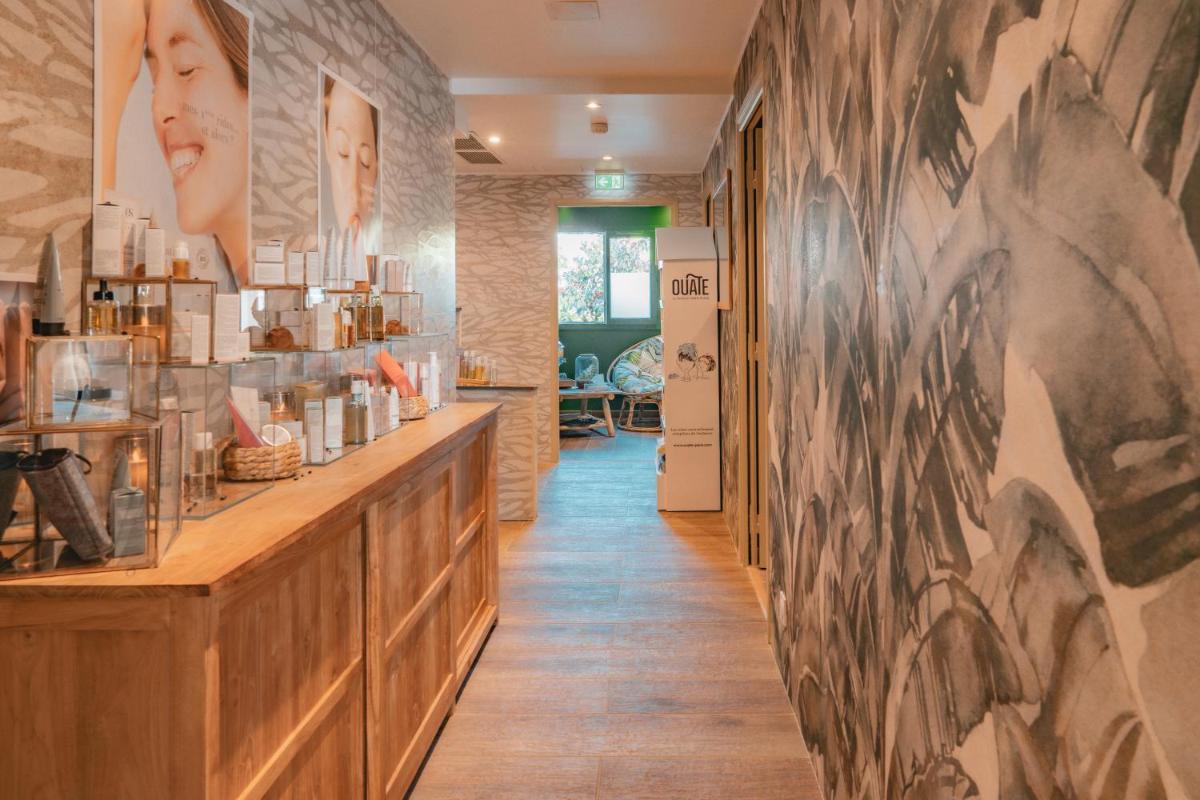Cuisine ou kitchenette dans l'établissement Hôtel Édenia - Spa Estime&Sens