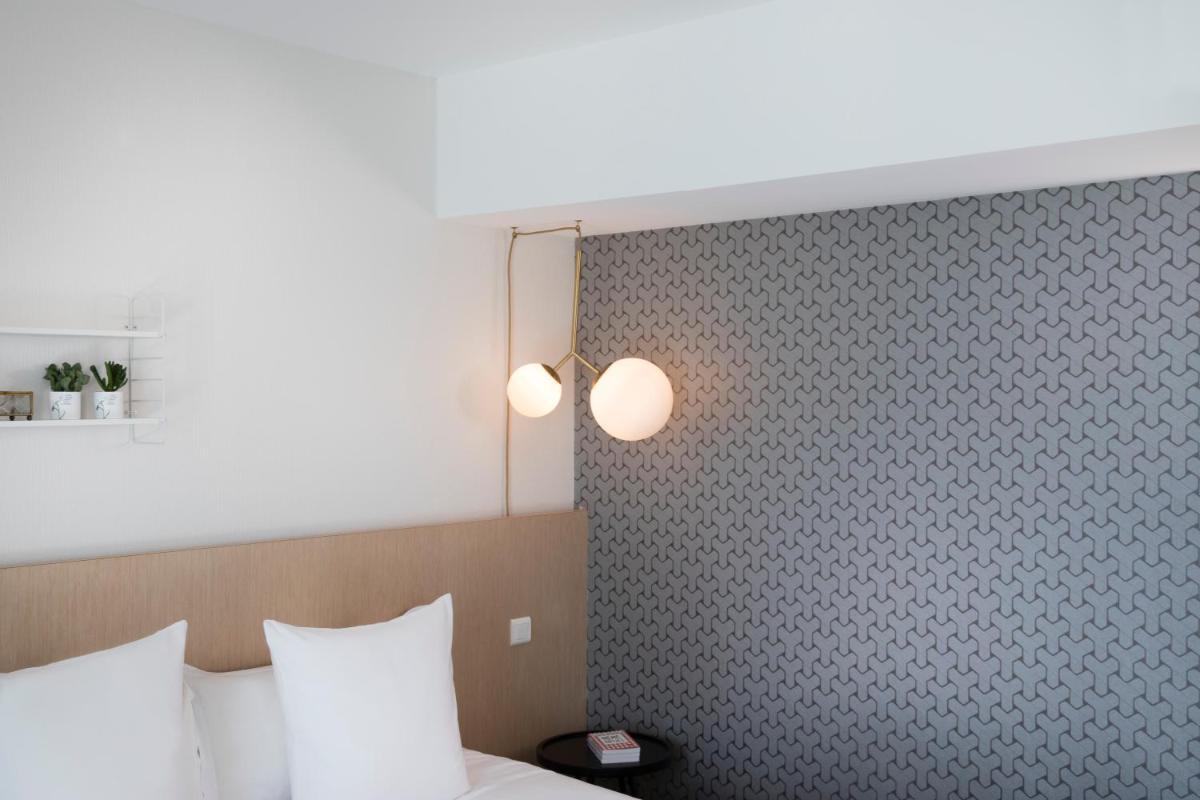 Un ou plusieurs lits dans un hébergement de l'établissement Best Western Plus Hotel les Rives du Ter