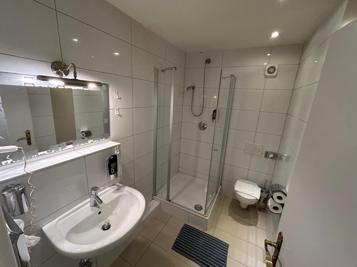 Ein Badezimmer in der Unterkunft Villa ENTO HotelWestEnd