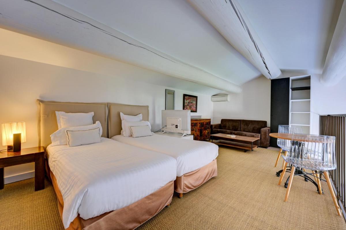 Un ou plusieurs lits dans un hébergement de l'établissement Hotel Bastide & SPA - Villa de Lourmarin