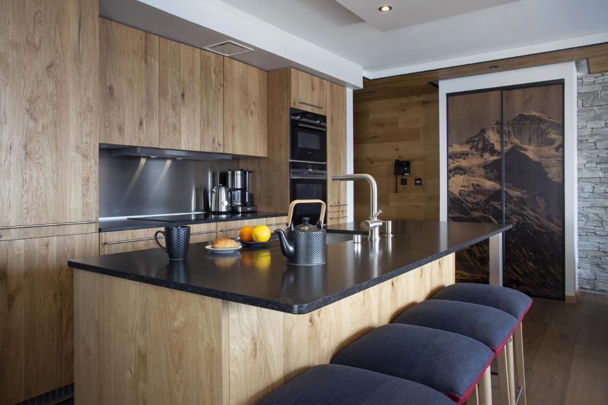 Cuisine ou kitchenette dans l'établissement Hôtel Alparena & Spa - 4 étoiles