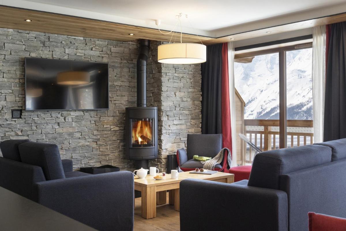 Coin salon dans l'établissement Hôtel Alparena & Spa - 4 étoiles