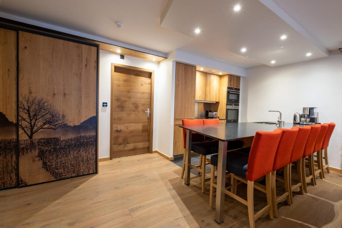 Cuisine ou kitchenette dans l'établissement Hôtel Alparena & Spa - 4 étoiles