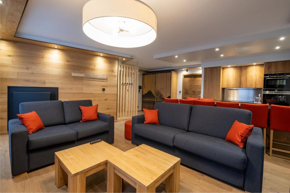 Coin salon dans l'établissement Hôtel Alparena & Spa - 4 étoiles