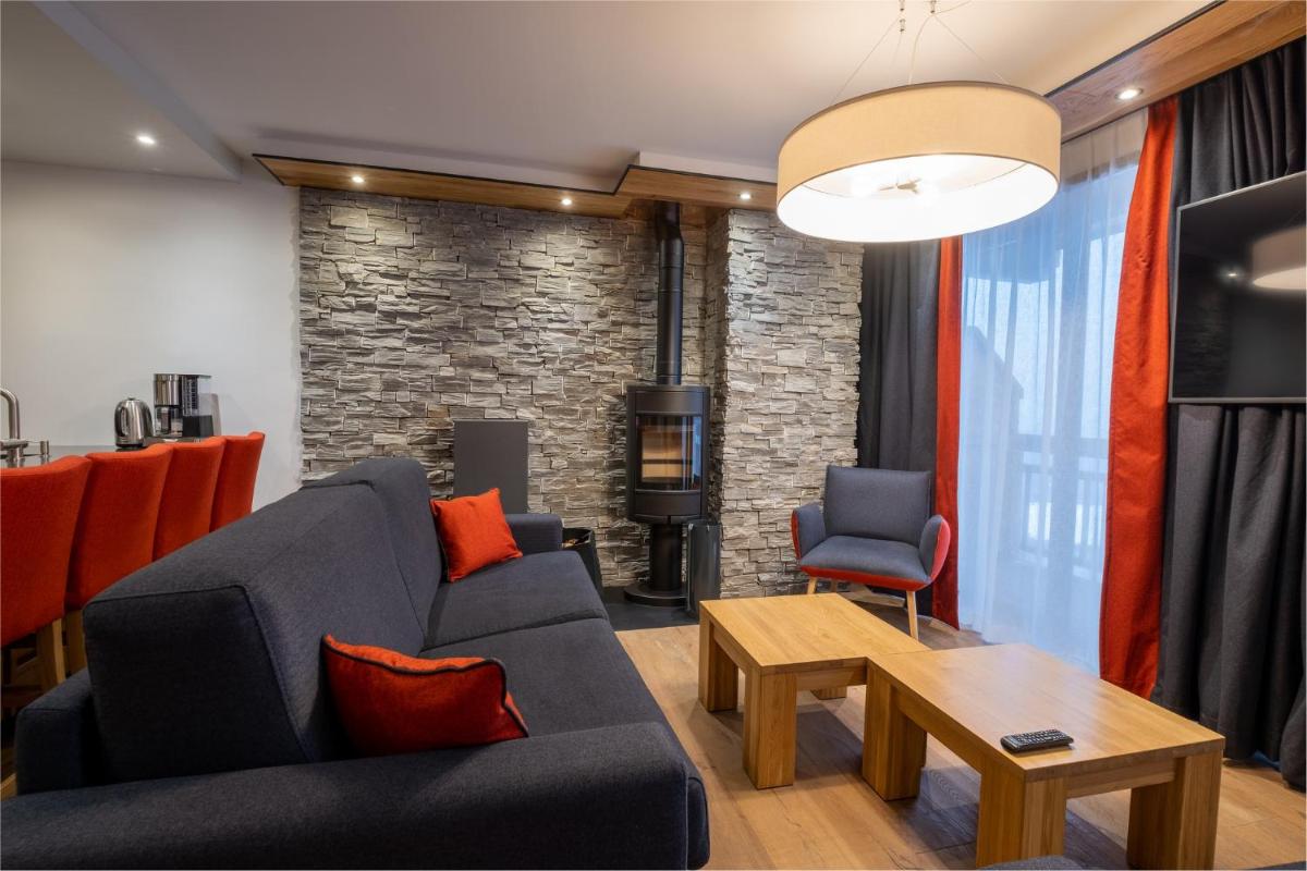 Coin salon dans l'établissement Hôtel Alparena & Spa - 4 étoiles